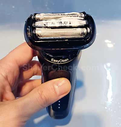 Cleaning the shaver with liquid soap and water.