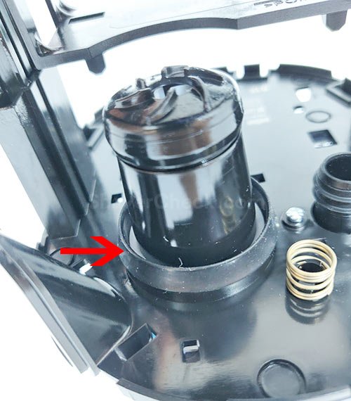 The gasket surrounding the impeller housing (red arrow).