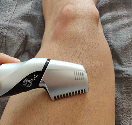 Trimming body hair with the ER-GK60 and the SkinGuard attachment.