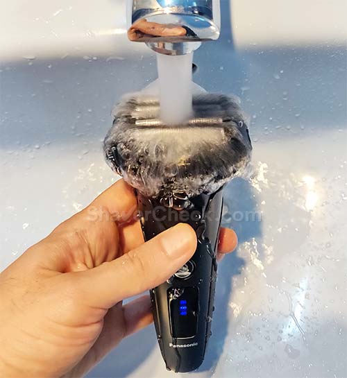 Cleaning the Arc 5 with water.