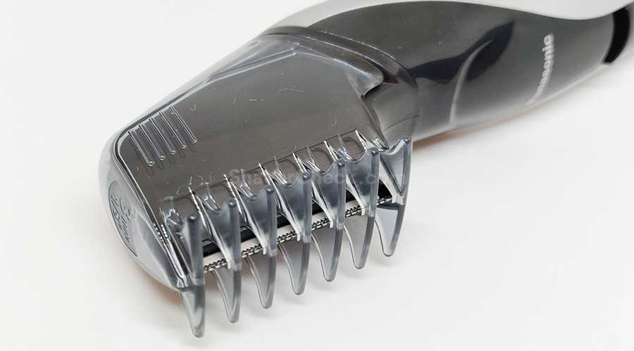 Using the comb attachments.