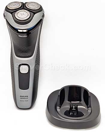 The Norelco Shaver 3800 and the included charging stand.