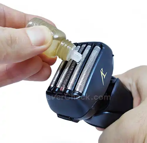 Lubricating a Panasonic foil shaver with the included oil.